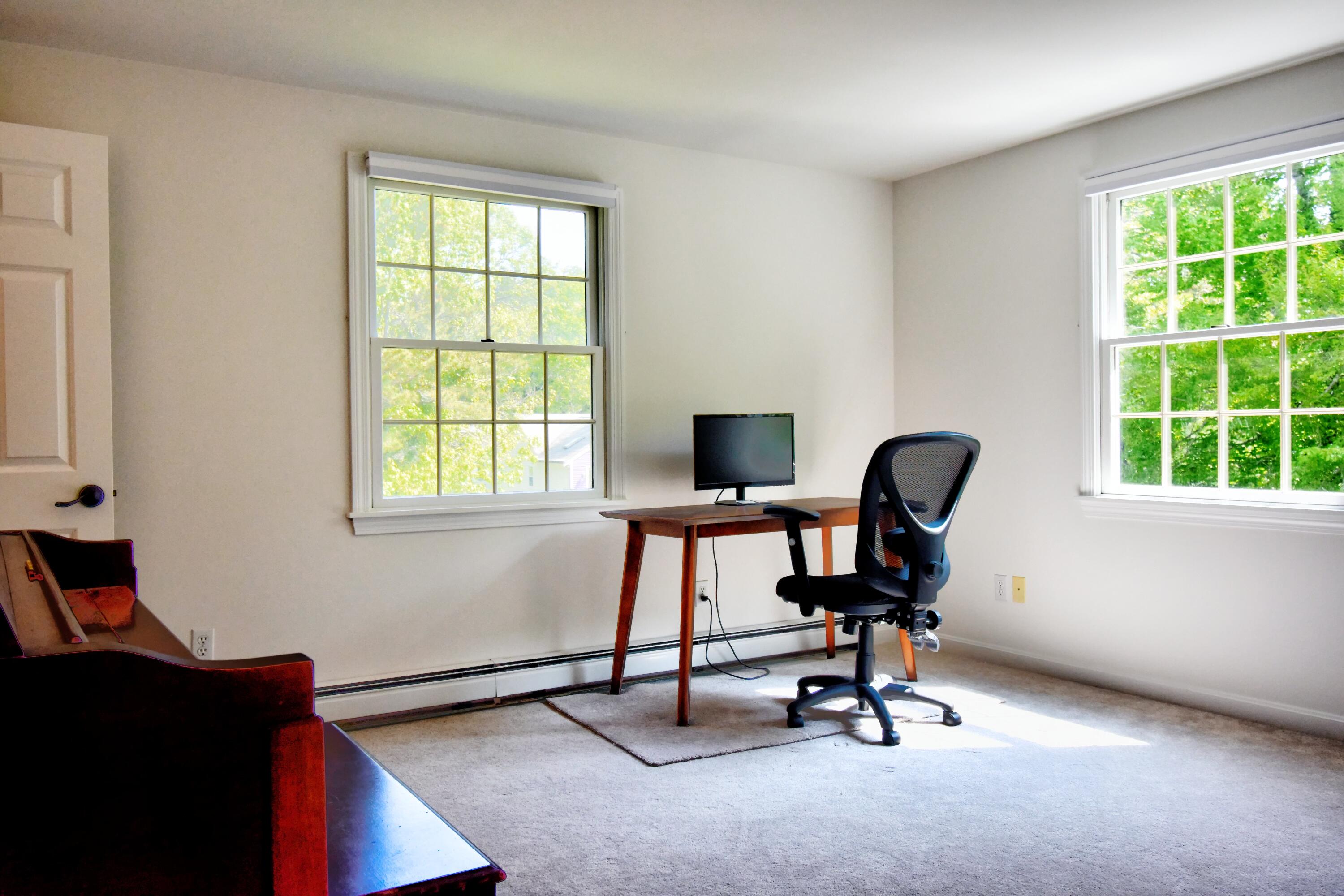 41 Turning Mill Road Brewster, MA 02631 - Photo 13 of 44 a view of a workspace with furniture and a window