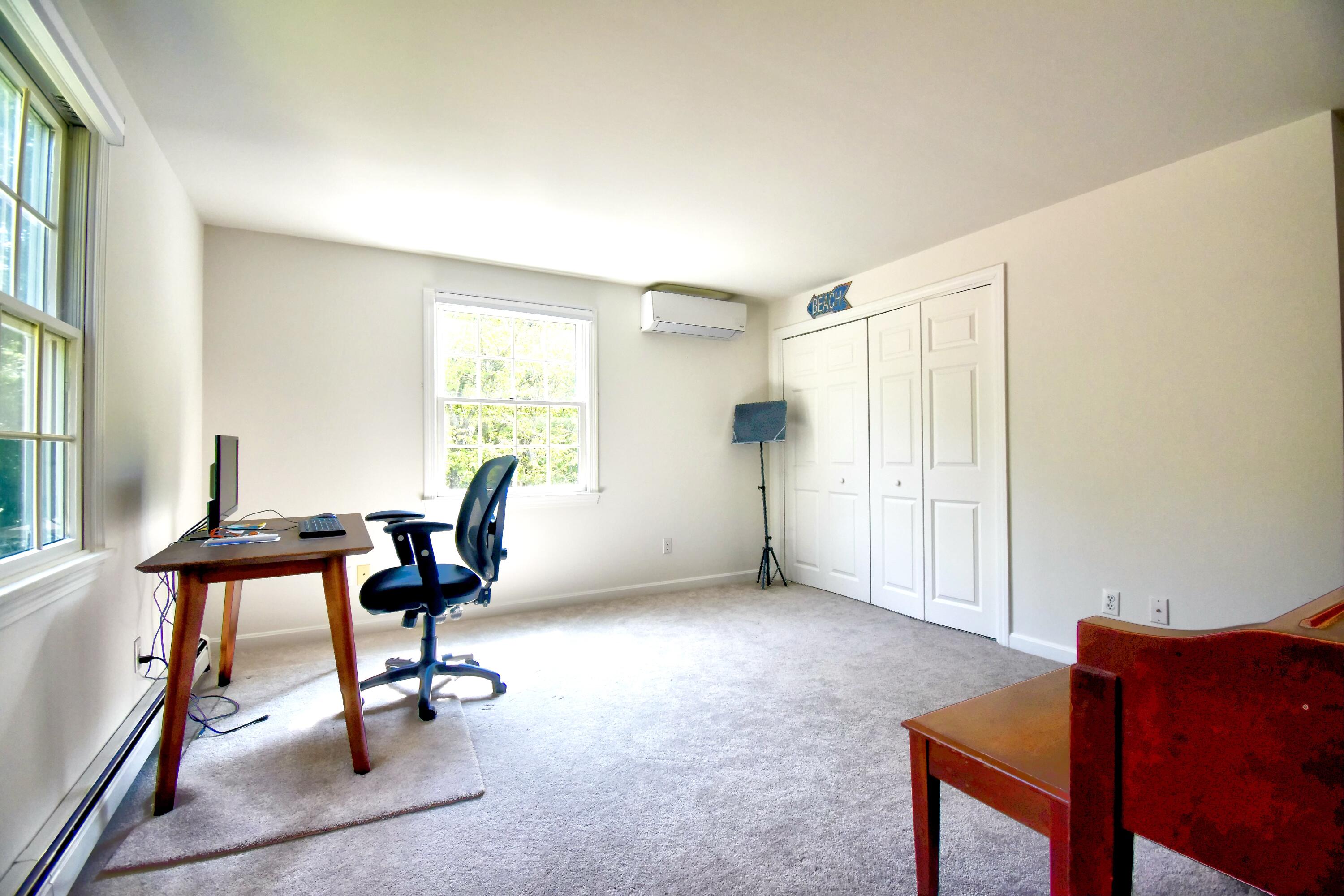 41 Turning Mill Road Brewster, MA 02631 - Photo 14 of 44 a view of a livingroom with furniture and a window