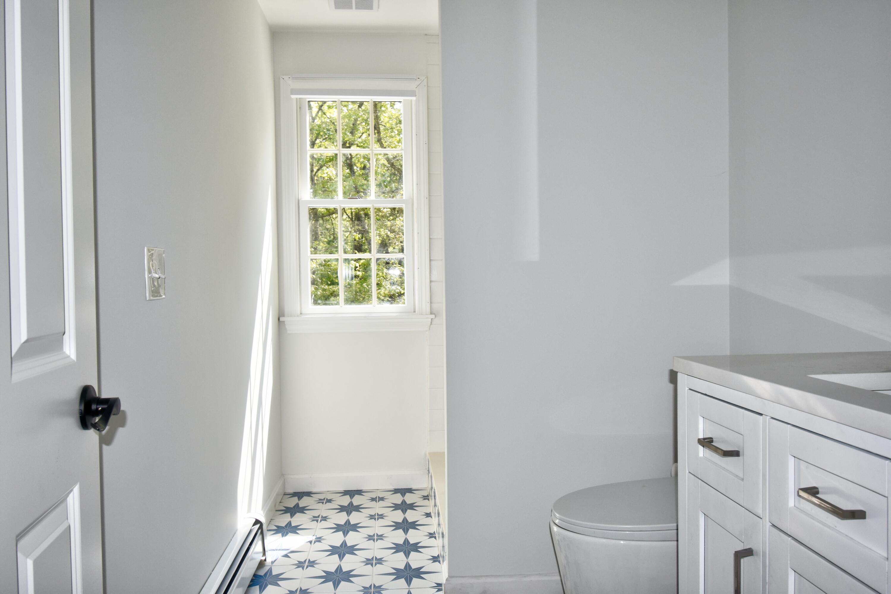 41 Turning Mill Road Brewster, MA 02631 - Photo 15 of 44 a bathroom with a toilet and a shower