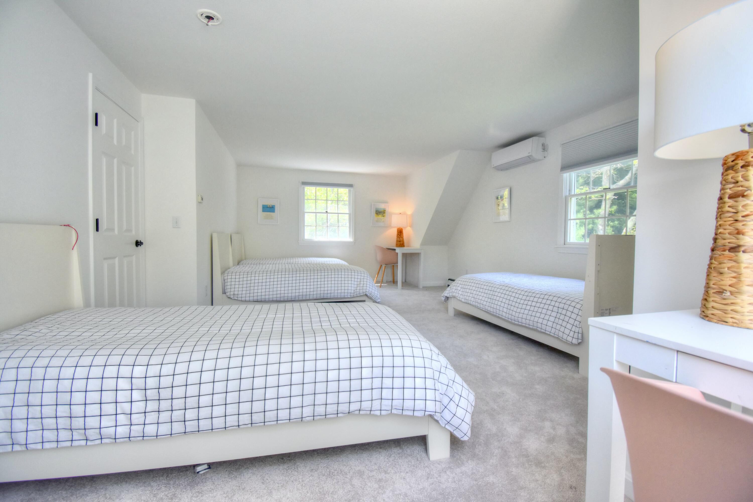 41 Turning Mill Road Brewster, MA 02631 - Photo 20 of 44 a bedroom with a bed and window