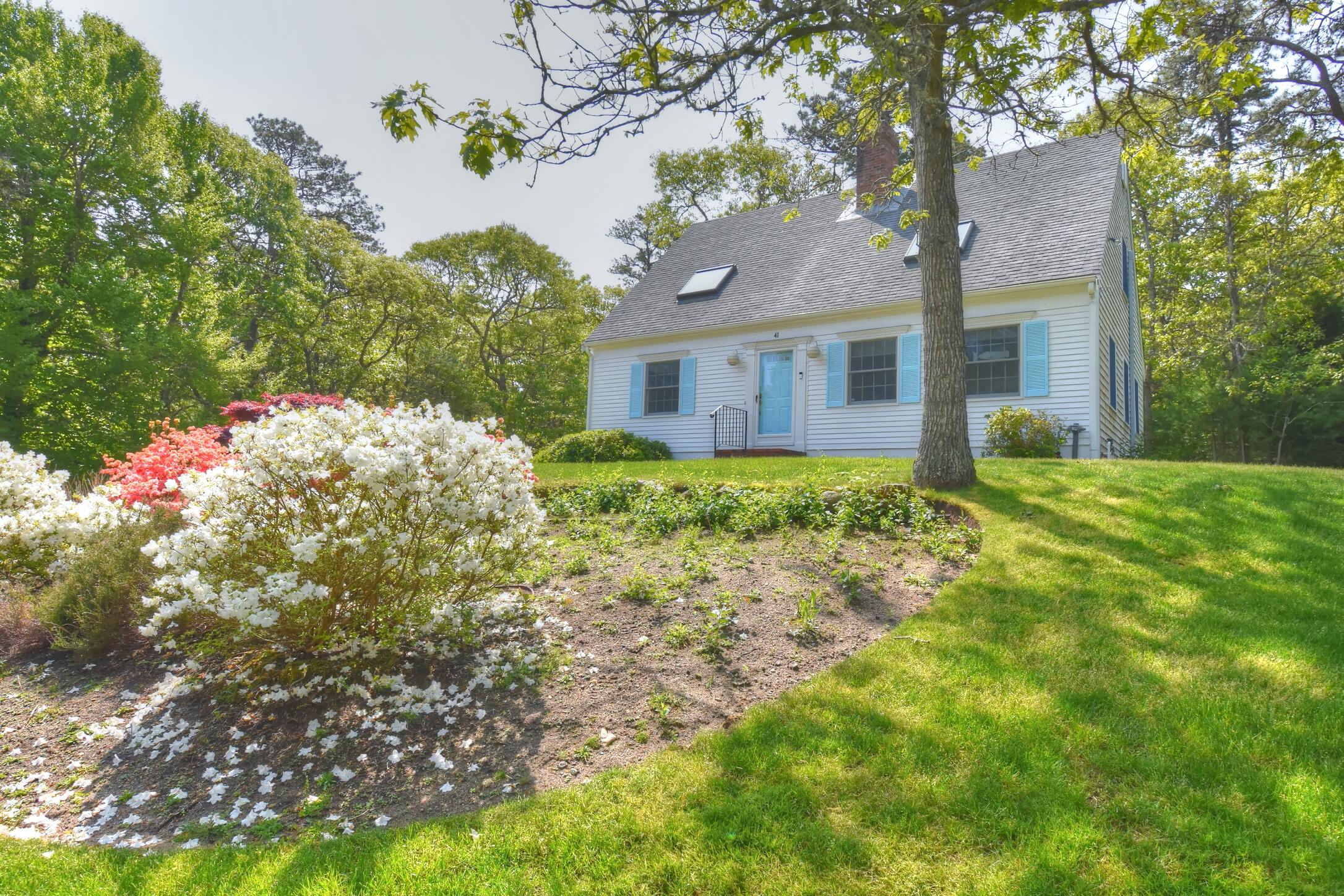 41 Turning Mill Road Brewster, MA 02631 - Photo 28 of 44 a house view with a garden space