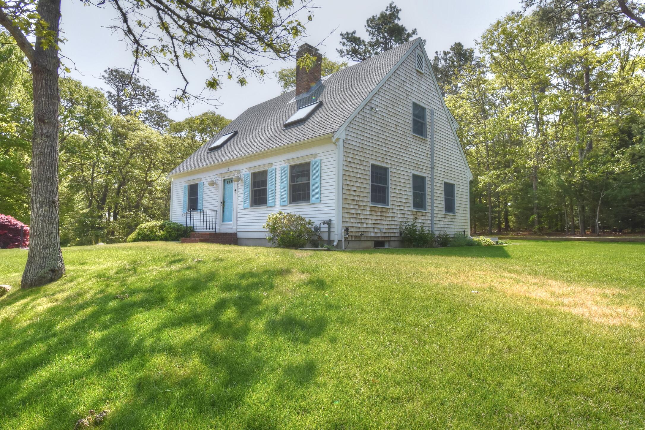 41 Turning Mill Road Brewster, MA 02631 - Photo 32 of 44 a view of a house with backyard and garden