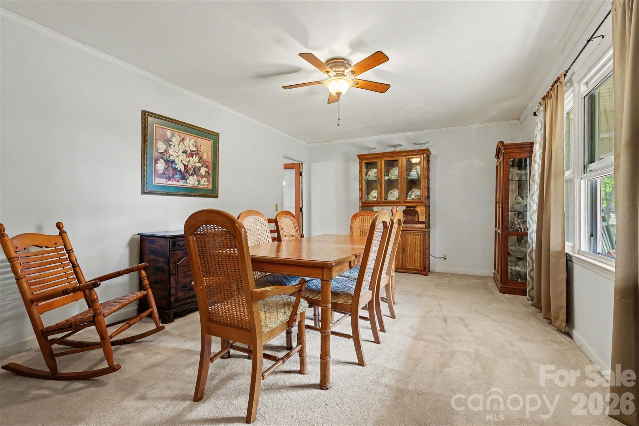 6774 Woodhaven Road Kershaw, SC 29067 - Photo 11 of 30 a view of a dining room with furniture and chandelier
