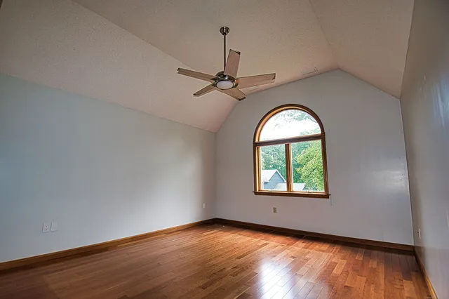 a white tub sitting next to a window