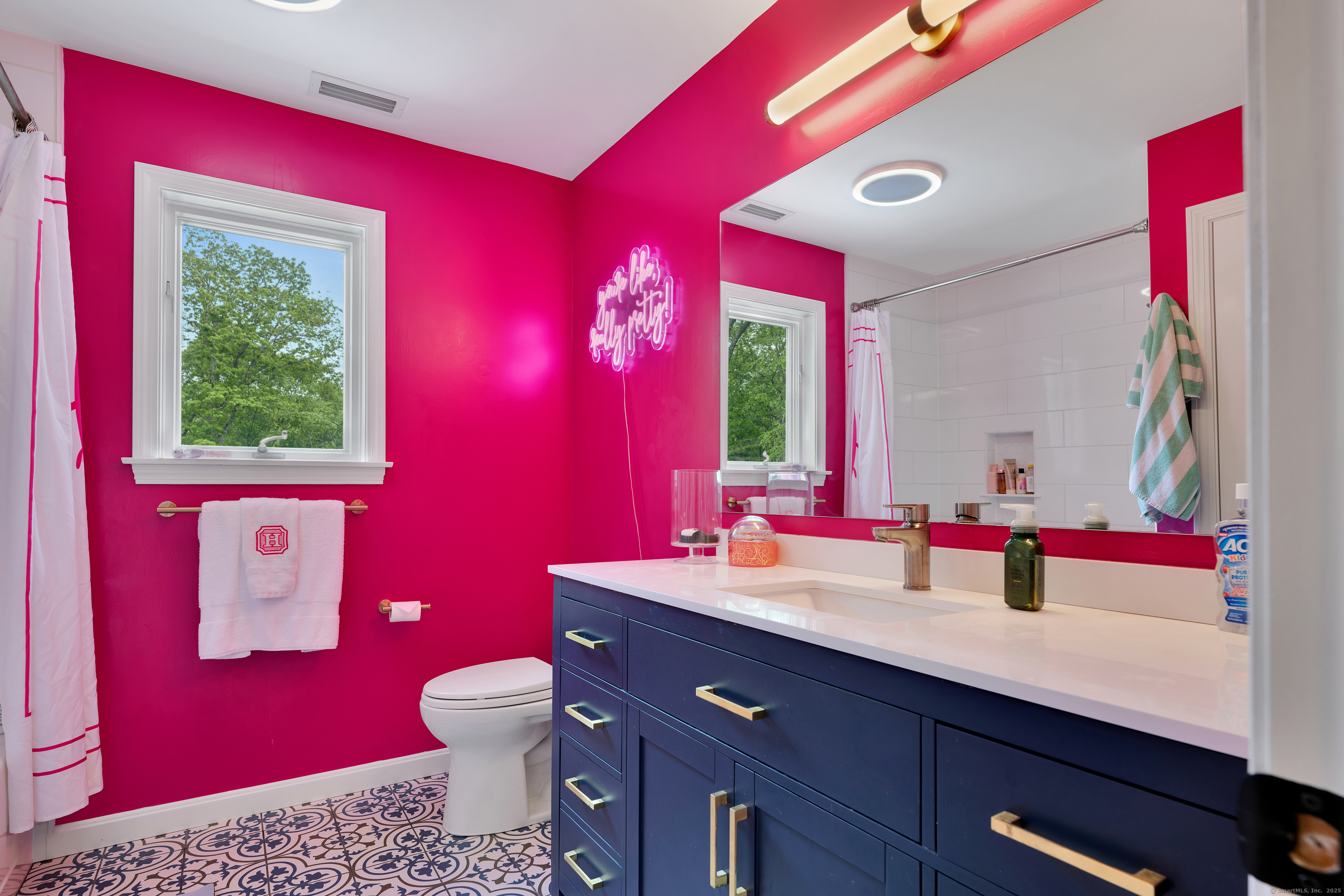 60 Wildcat Road Burlington, CT 06013 - Photo 26 of 39 a bathroom with a sink vanity mirror and toilet
