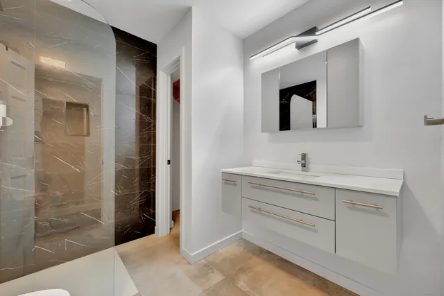 a balcony with view of trees in front of it