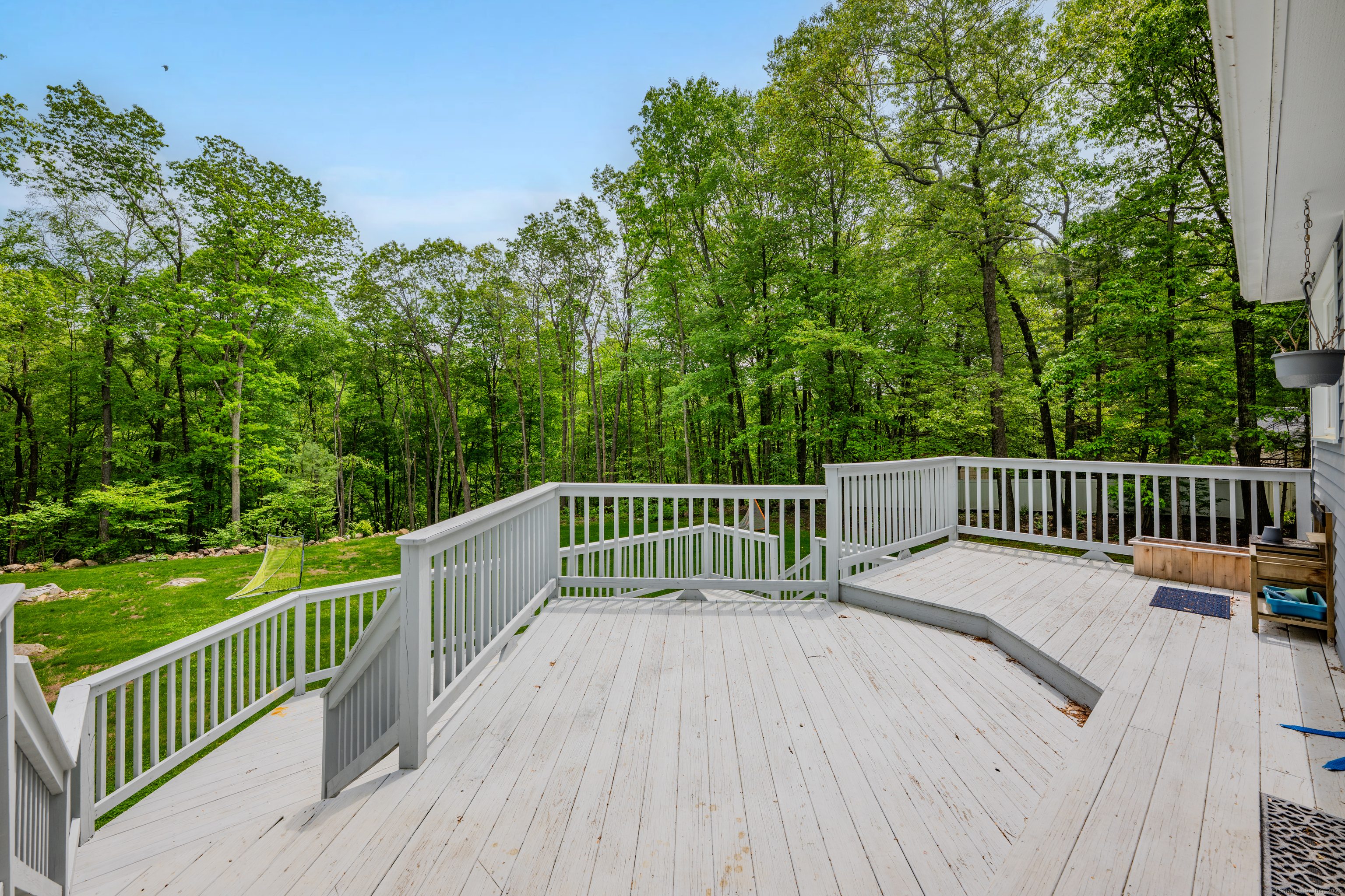 60 Wildcat Road Burlington, CT 06013 - Photo 35 of 39 a balcony with view of trees in front of it