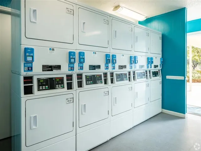 a view of cabinets with white walls