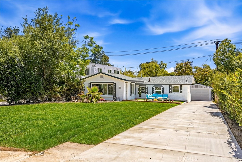 1280 East Woodbury Road Pasadena, CA 91104 - Photo 40 of 40 a front view of a house with a yard