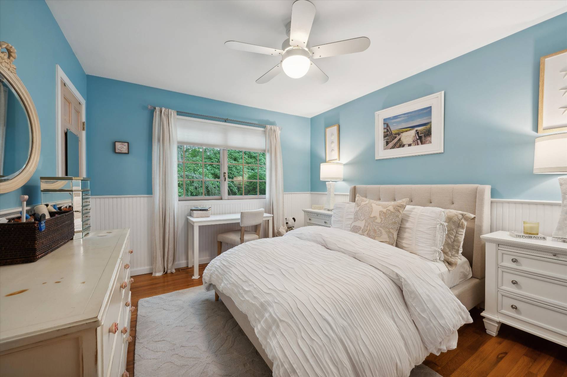 25 Midhampton Avenue Quogue, NY 11959 - Photo 25 of 32 a bedroom with a bed and a large window