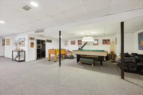 a living room with furniture and a table