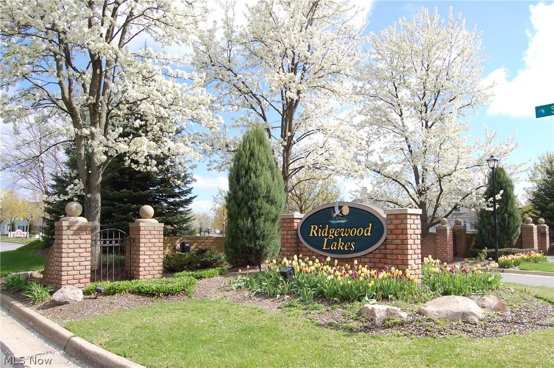659 Sunridge Road Fairlawn, OH 44333 - Photo 35 of 35 Lovely Spring photo of the main entrance to Ridgewood Lakes with daffodils in bloom
