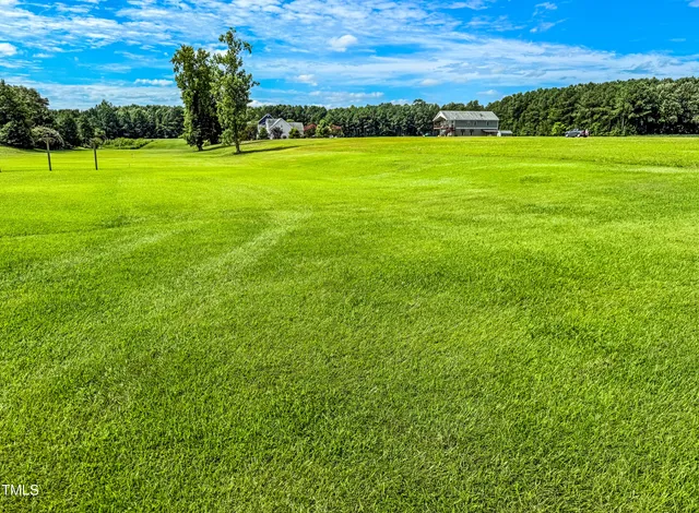 a view of an ocean with a big yard