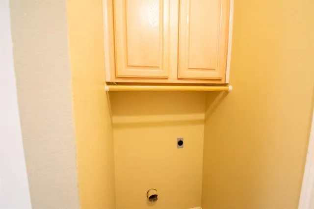 a view of a patio with table and chairs with wooden floor and fence