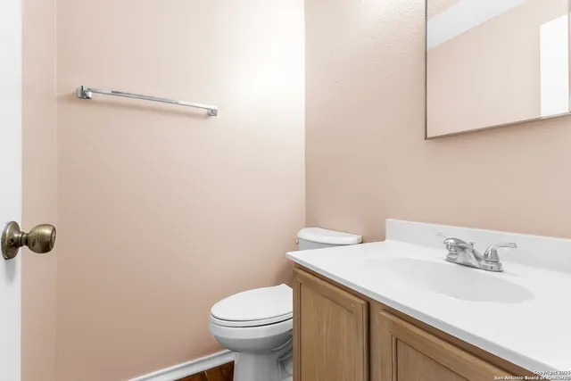 a bathroom with a sink and a toilet