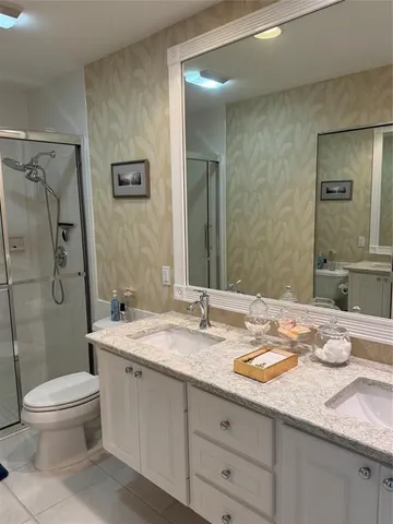 a view of a chairs and table on the green field