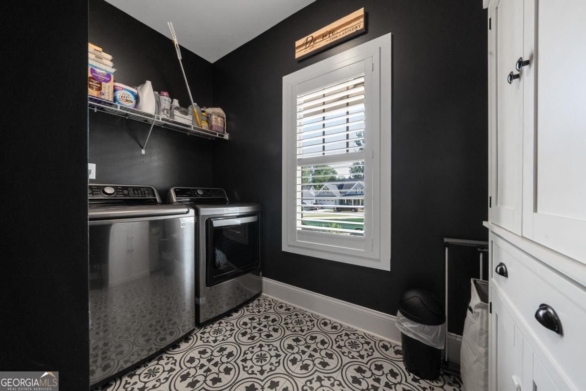 757 Markhams Drive Madison, GA 30650 - Photo 35 of 46 a kitchen with a sink a stove and cabinets