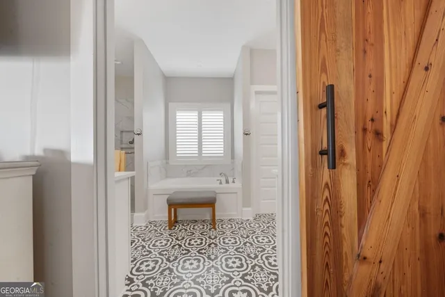 a bathroom with a shower and a toilet