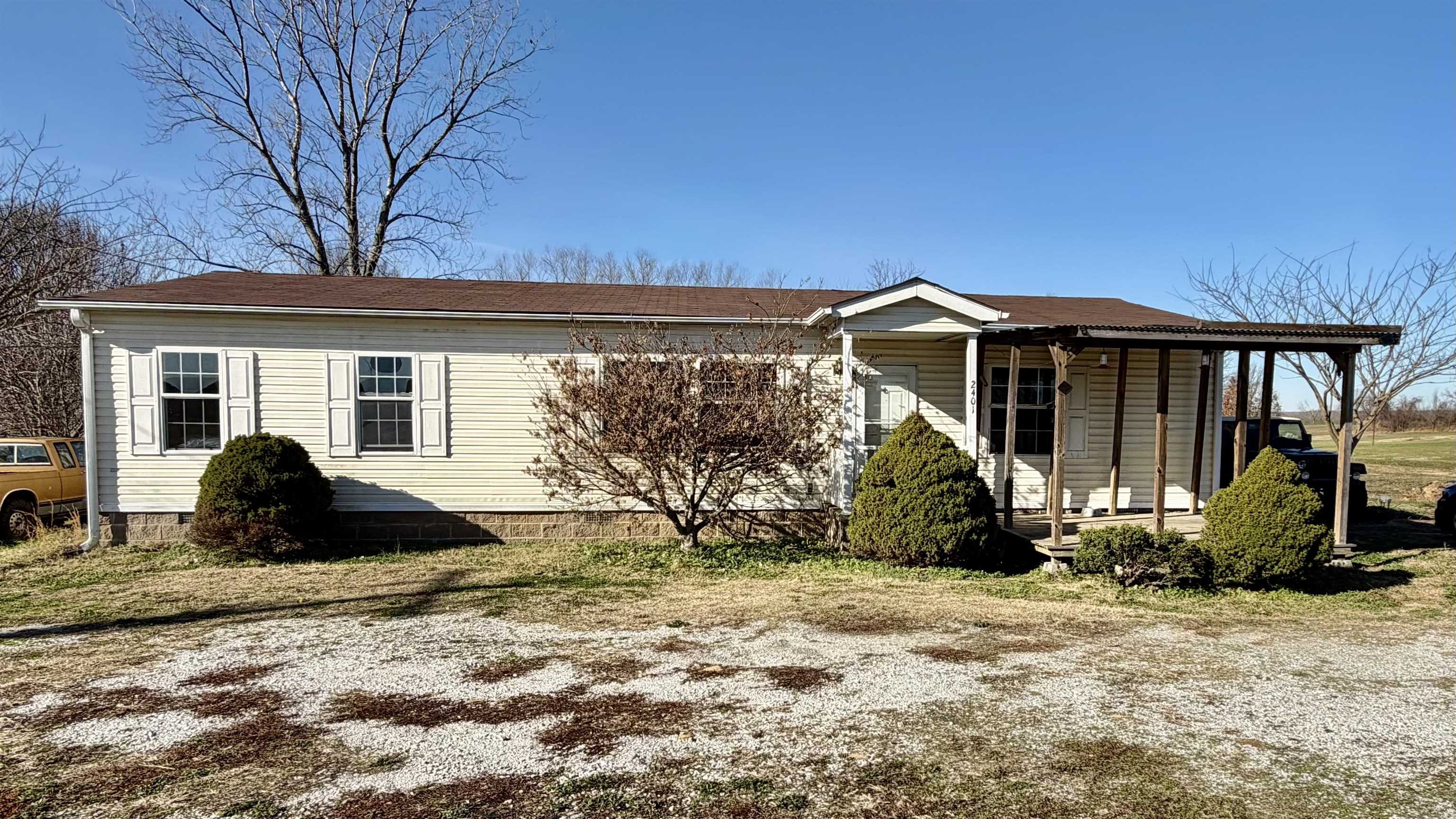 View of front of house featuring covered porch