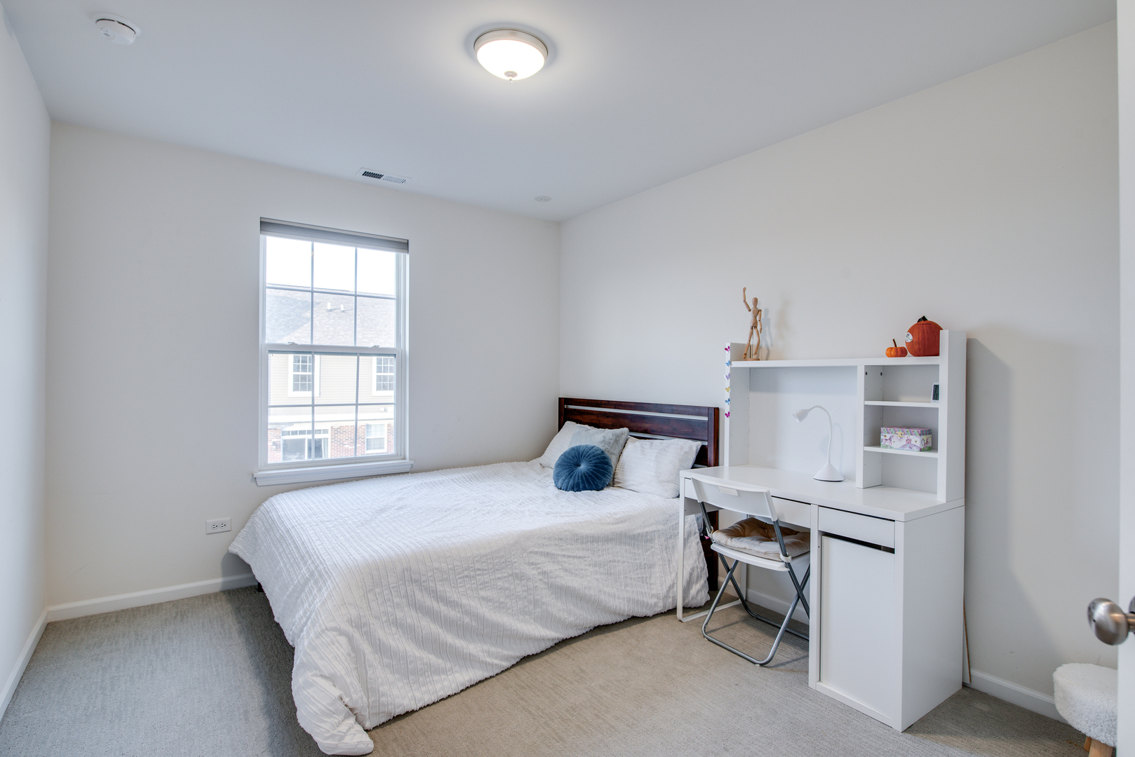 4477 Monroe Court Naperville, IL 60564 - Photo 16 of 23 a bedroom with a bed and a window