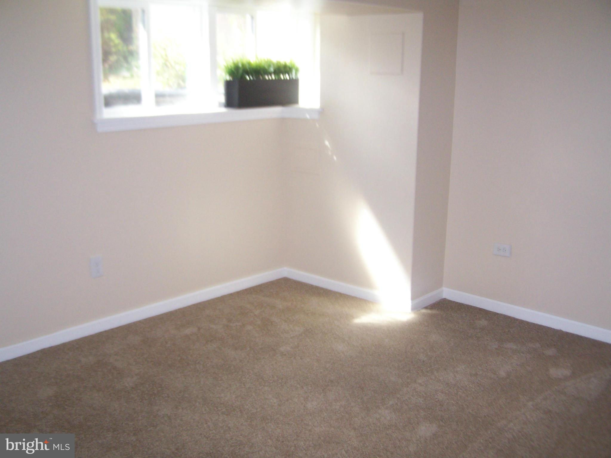 1602 East Cold Spring Lane Baltimore, MD 21218 - Photo 11 of 13 Lower Level Family Room