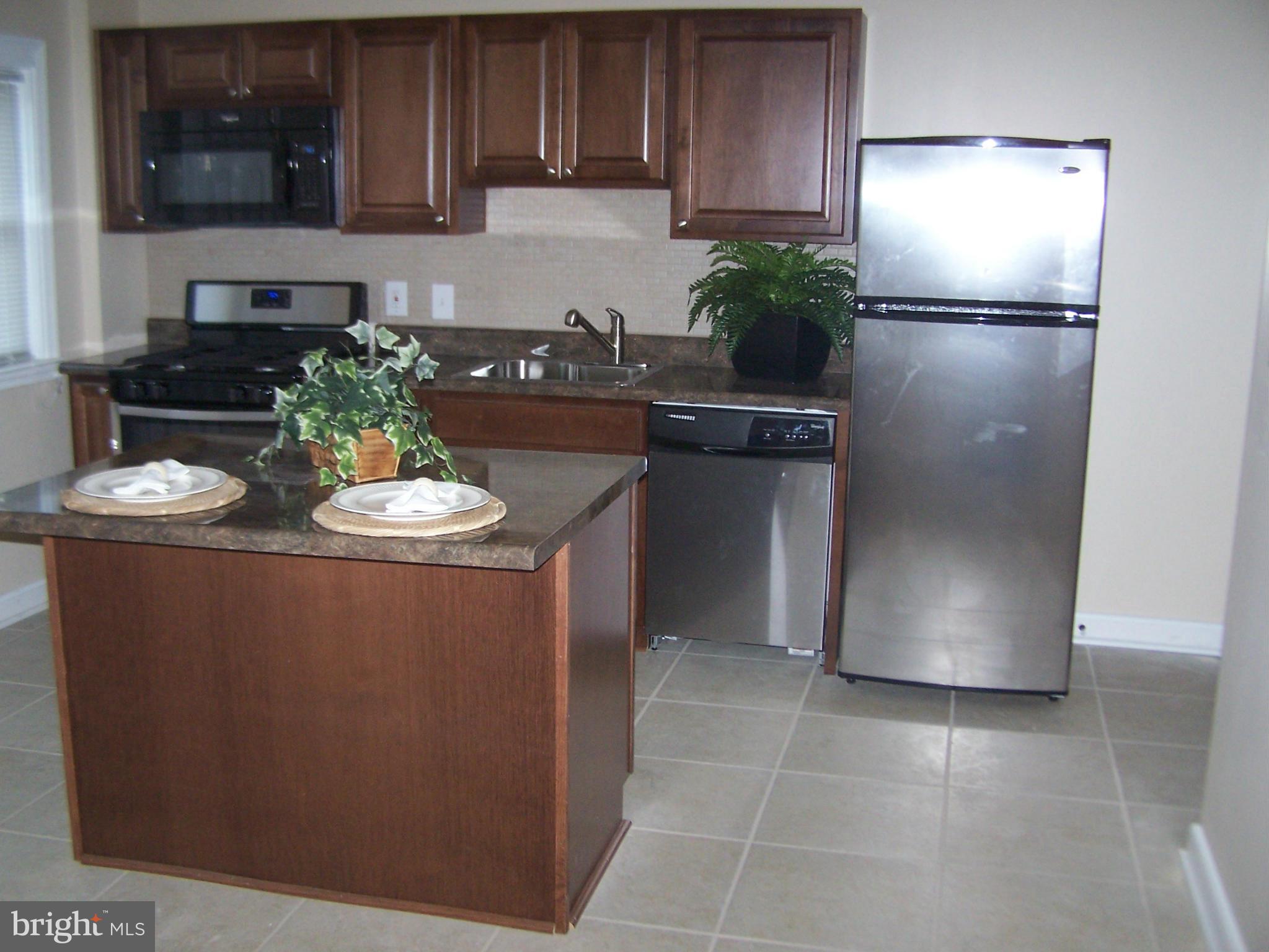 1602 East Cold Spring Lane Baltimore, MD 21218 - Photo 4 of 13 Kitchen