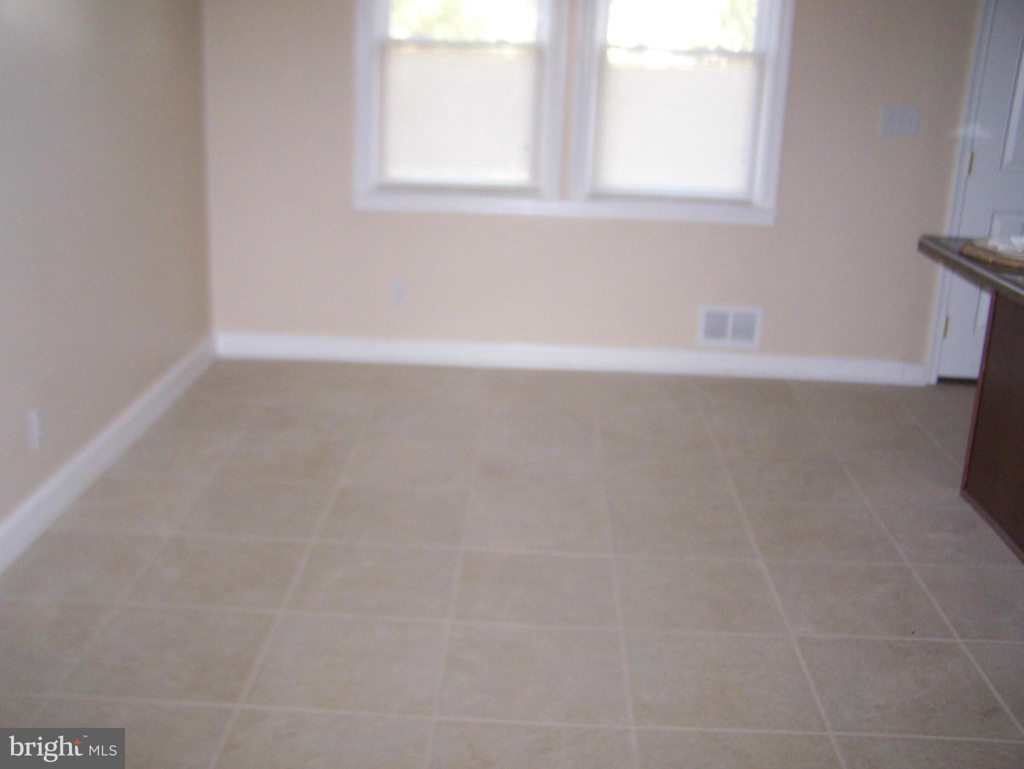 1602 East Cold Spring Lane Baltimore, MD 21218 - Photo 6 of 13 Dining Room
