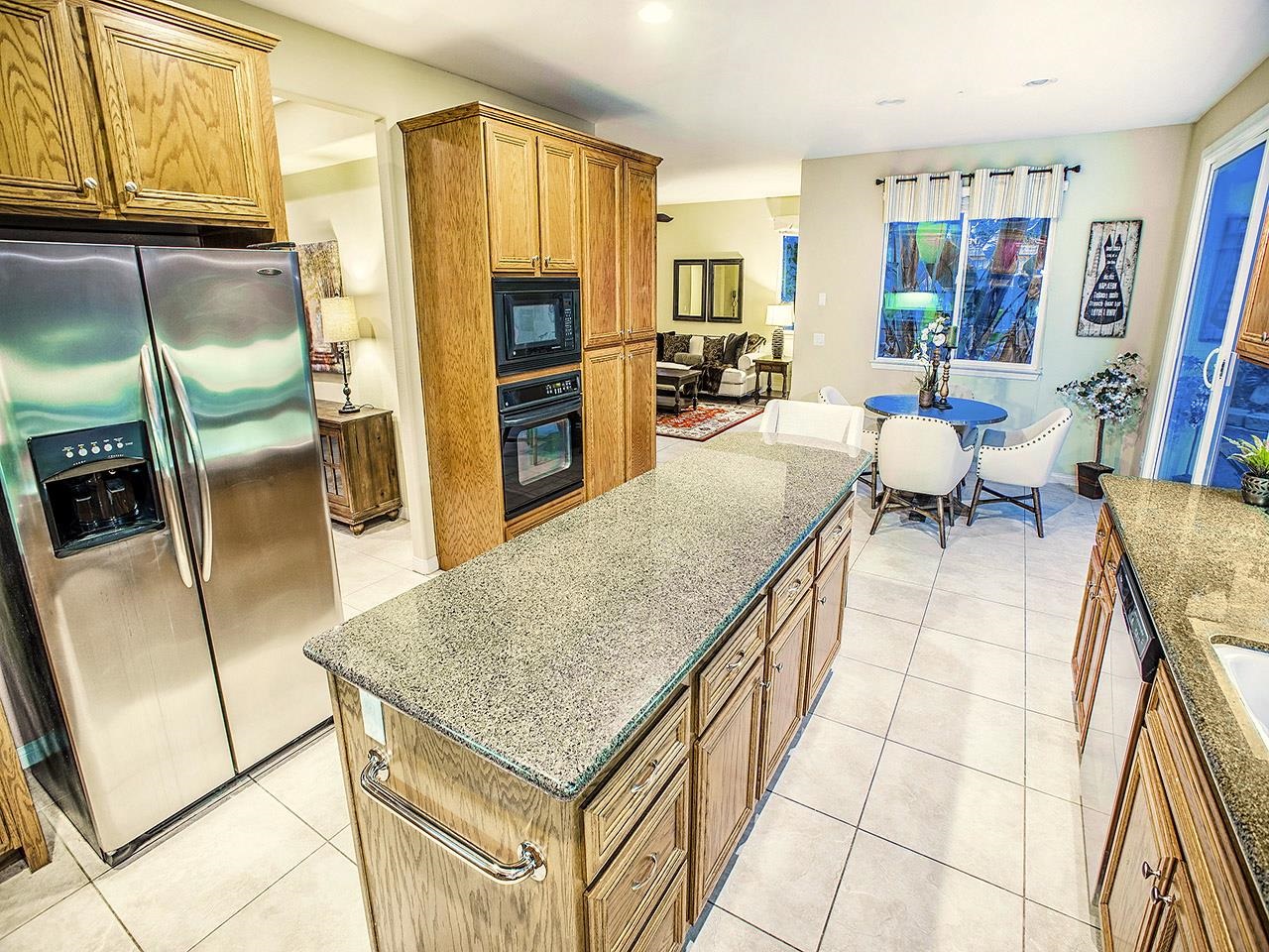 1178 Mariposa Road Carlsbad, CA 92011 - Photo 7 of 25 huge center island and granite countertops