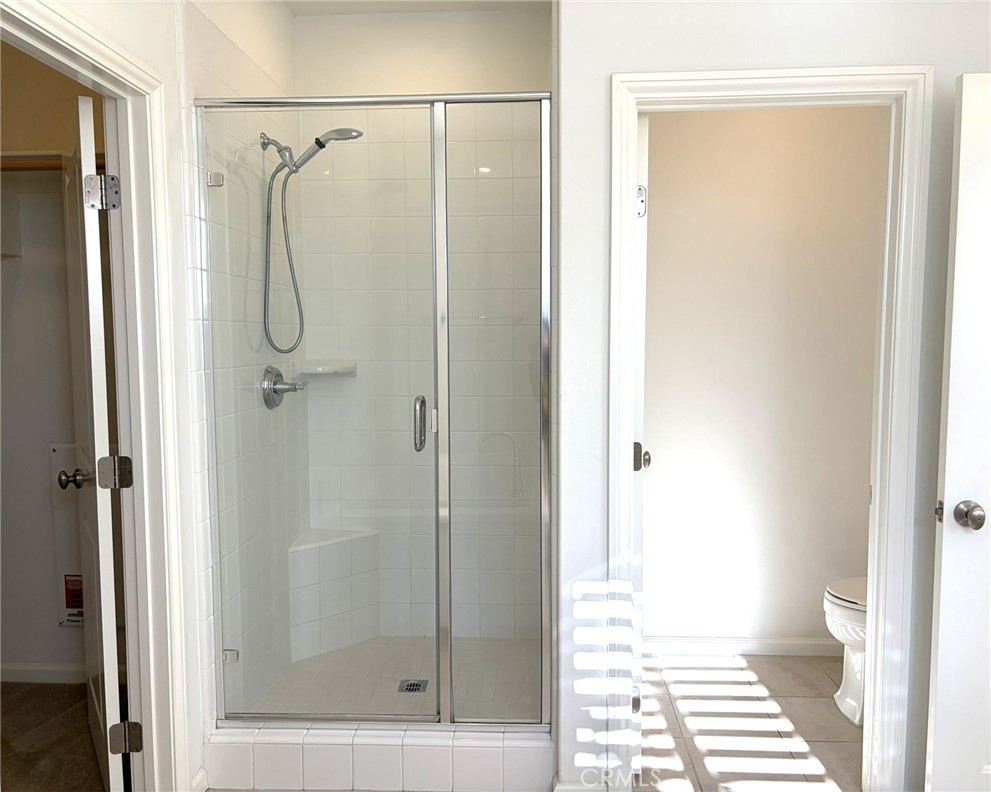 178 Working Ranch Irvine, CA 92602 - Photo 18 of 42 a bathroom with a shower and a toilet