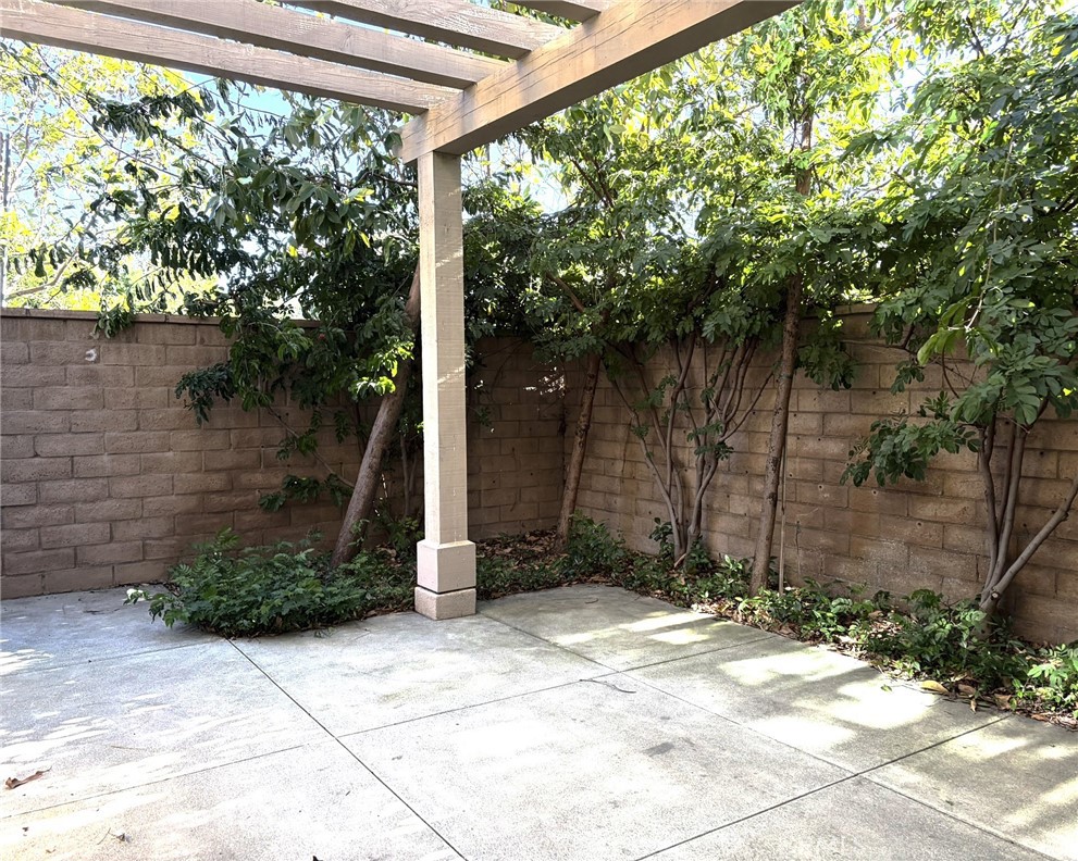 178 Working Ranch Irvine, CA 92602 - Photo 28 of 42 a couple of potted plants in front of door