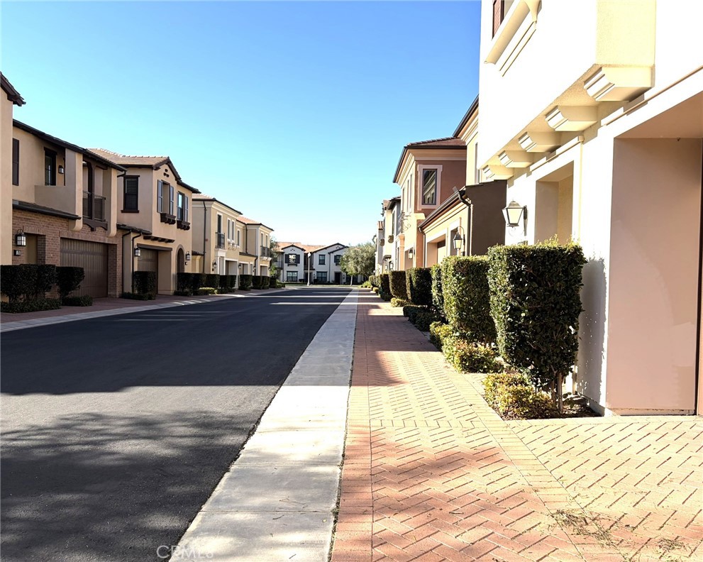 178 Working Ranch Irvine, CA 92602 - Photo 35 of 42 a street view with tall buildings