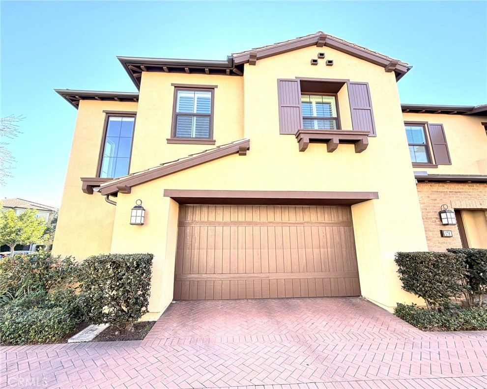 178 Working Ranch Irvine, CA 92602 - Photo 36 of 42 a front view of a house with garden