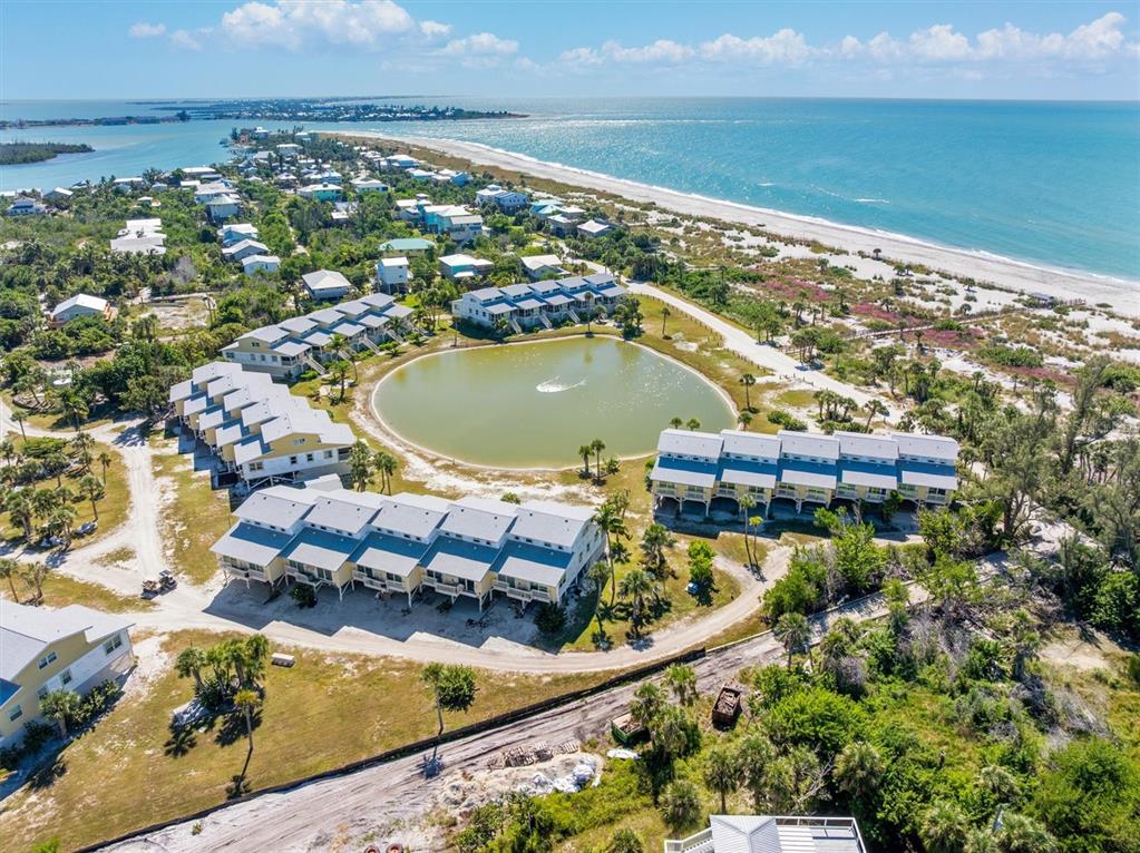 9400 Little Gasparilla, Unit H2 Placida, FL 33946 - Photo 26 of 47 a view of a balcony with an ocean
