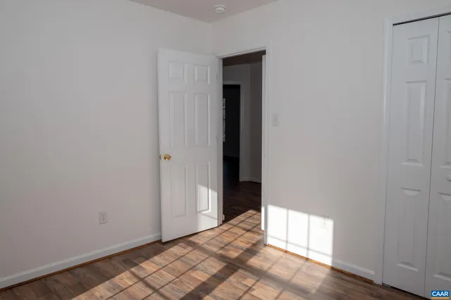 a view of a room with a large window and shower