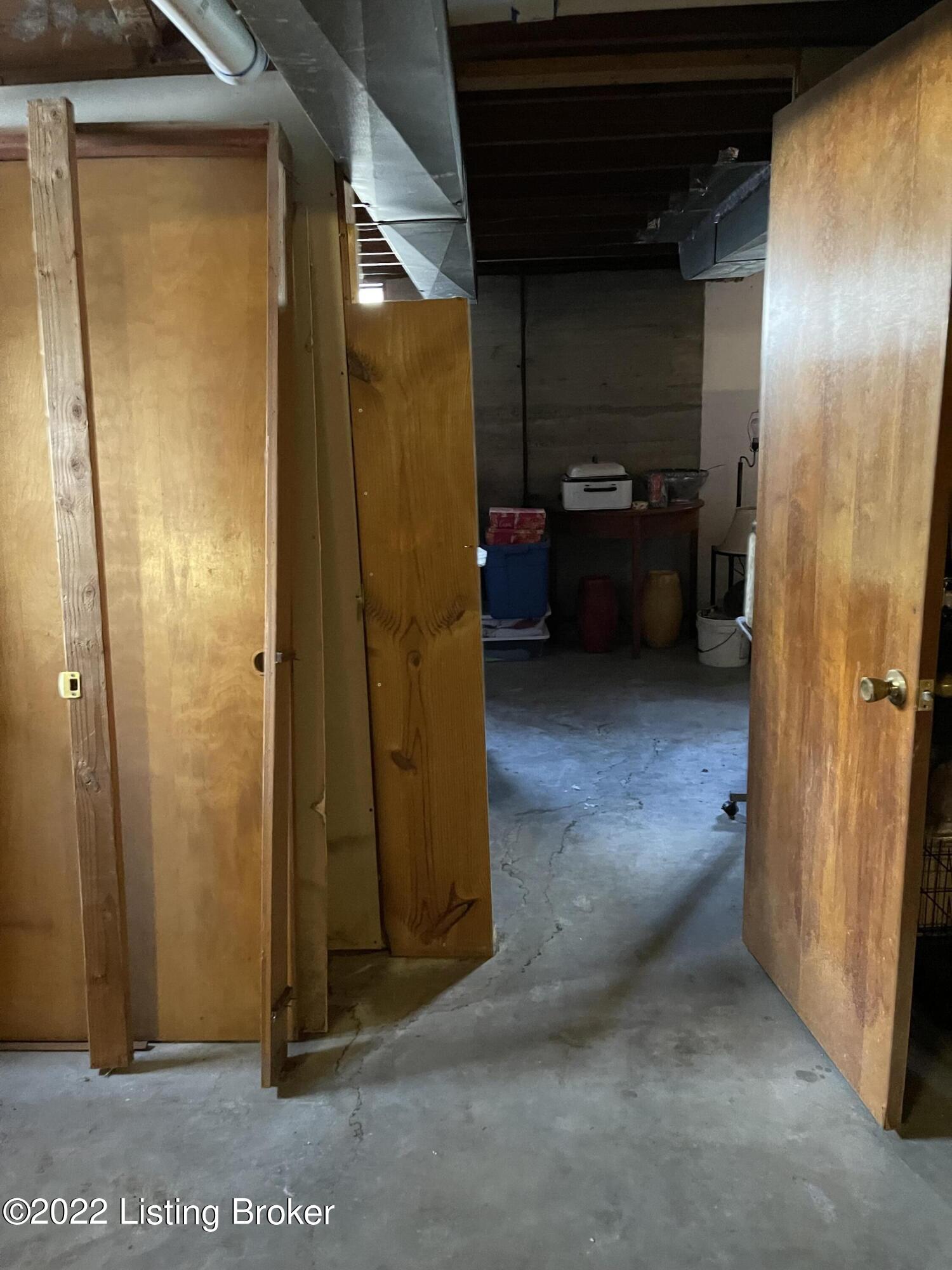 8208 3rd Street Road Louisville, KY 40214 - Photo 73 of 75 This door leads into another storage area in basement
