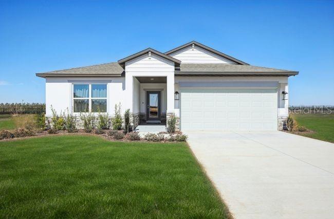 12003 Robina Road Weeki Wachee, FL 34614 - Photo 1 of 20 a view of an house with backyard space and balcony