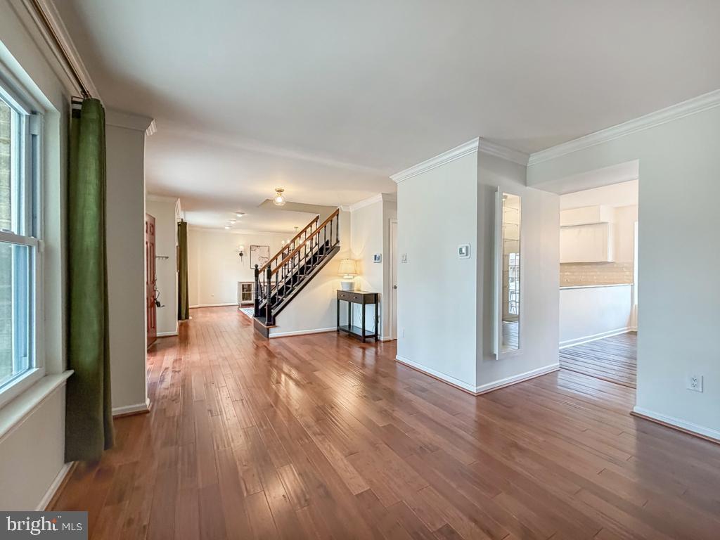 738 Bridgeview Road Feasterville-Trevose, PA 19053 - Photo 12 of 54 a view of a hallway with wooden floor and staircase