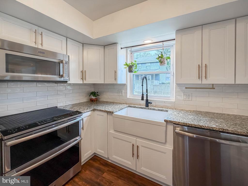 738 Bridgeview Road Feasterville-Trevose, PA 19053 - Photo 16 of 54 a kitchen with appliances cabinets and a sink