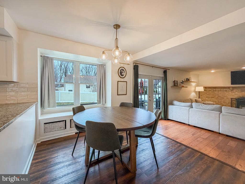 738 Bridgeview Road Feasterville-Trevose, PA 19053 - Photo 22 of 54 a view of a dining room with furniture window and wooden floor