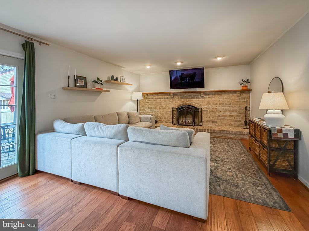 738 Bridgeview Road Feasterville-Trevose, PA 19053 - Photo 26 of 54 a living room with furniture and a fireplace