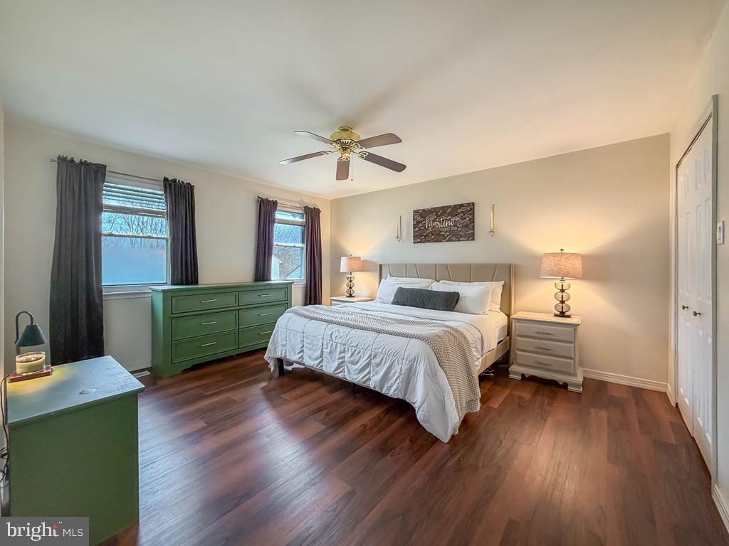 738 Bridgeview Road Feasterville-Trevose, PA 19053 - Photo 32 of 54 a spacious bedroom with a bed and a chandelier