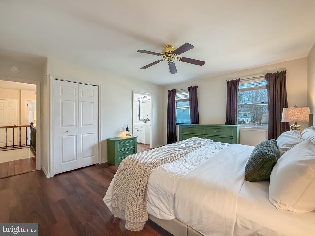 738 Bridgeview Road Feasterville-Trevose, PA 19053 - Photo 33 of 54 a spacious bedroom with a bed and a chandelier