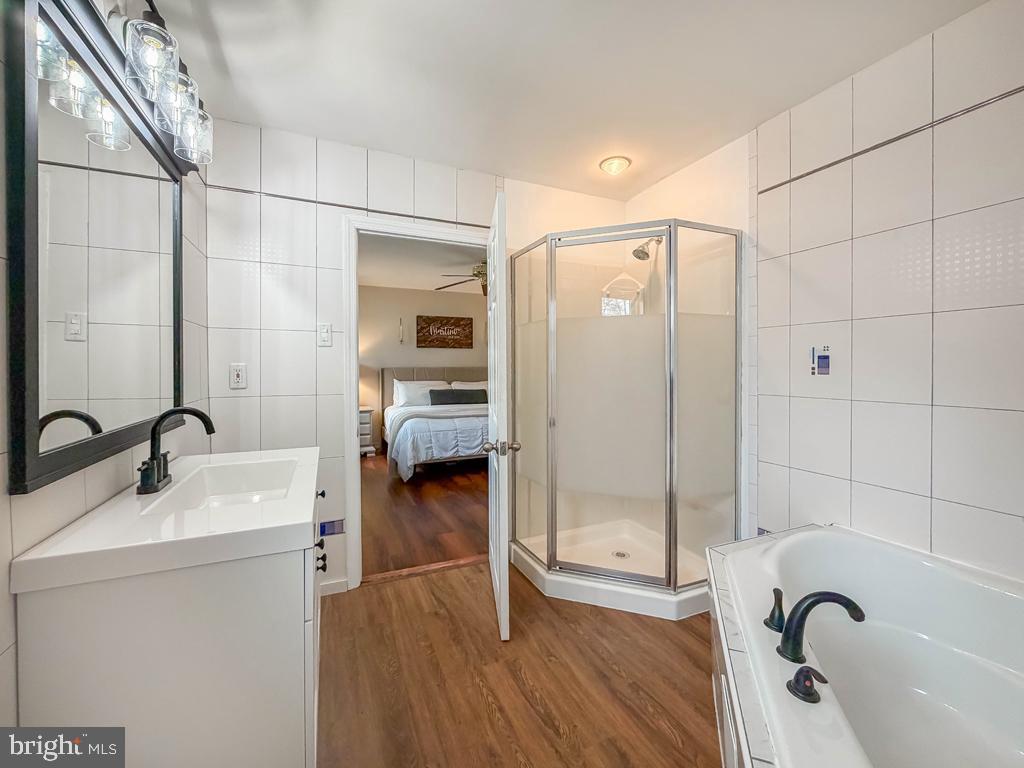 738 Bridgeview Road Feasterville-Trevose, PA 19053 - Photo 37 of 54 a bathroom with a tub and a sink