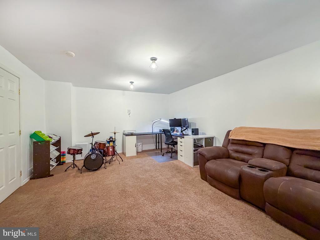 738 Bridgeview Road Feasterville-Trevose, PA 19053 - Photo 47 of 54 a view of a livingroom with furniture and a couch
