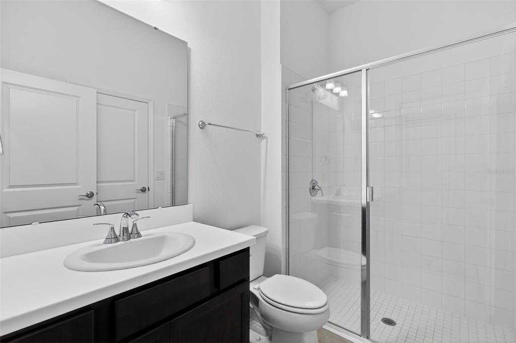 810 MIDDLETON Street DeBary, FL 32713 - Photo 42 of 52 a bathroom with a sink toilet and shower