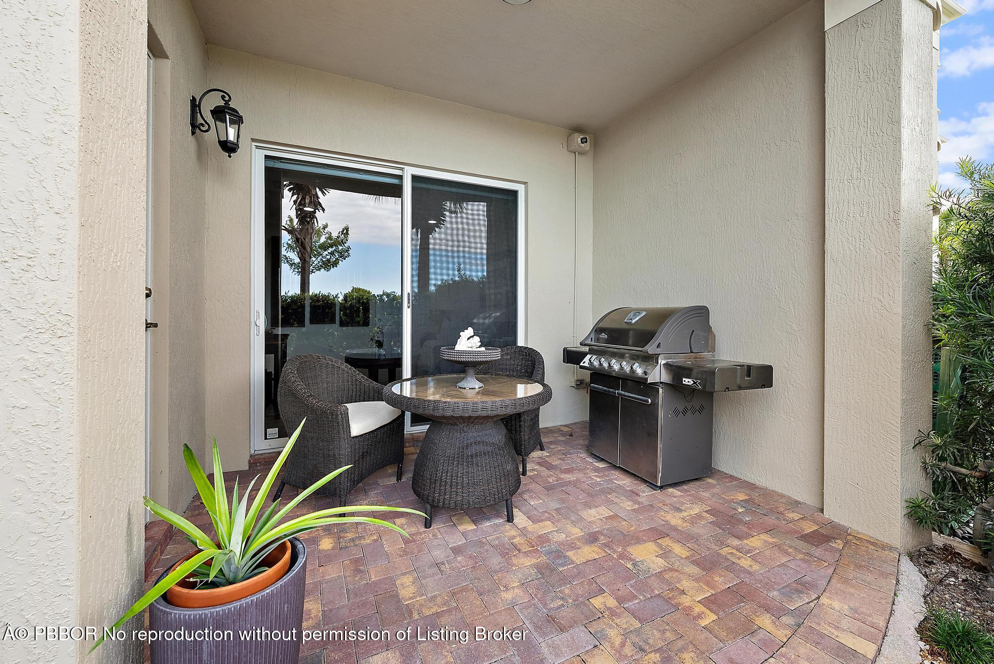 138 Tierra Lane, Unit 6 Jupiter, FL 33477 - Photo 31 of 41 Patio
