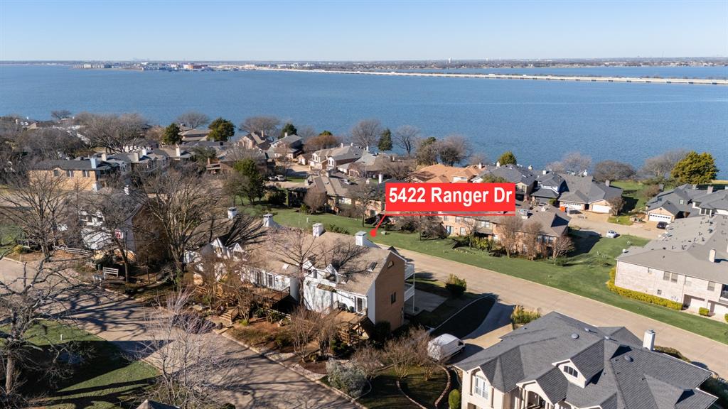 5422 Ranger Drive Rockwall, TX 75032 - Photo 1 of 32 a view of a city and ocean view