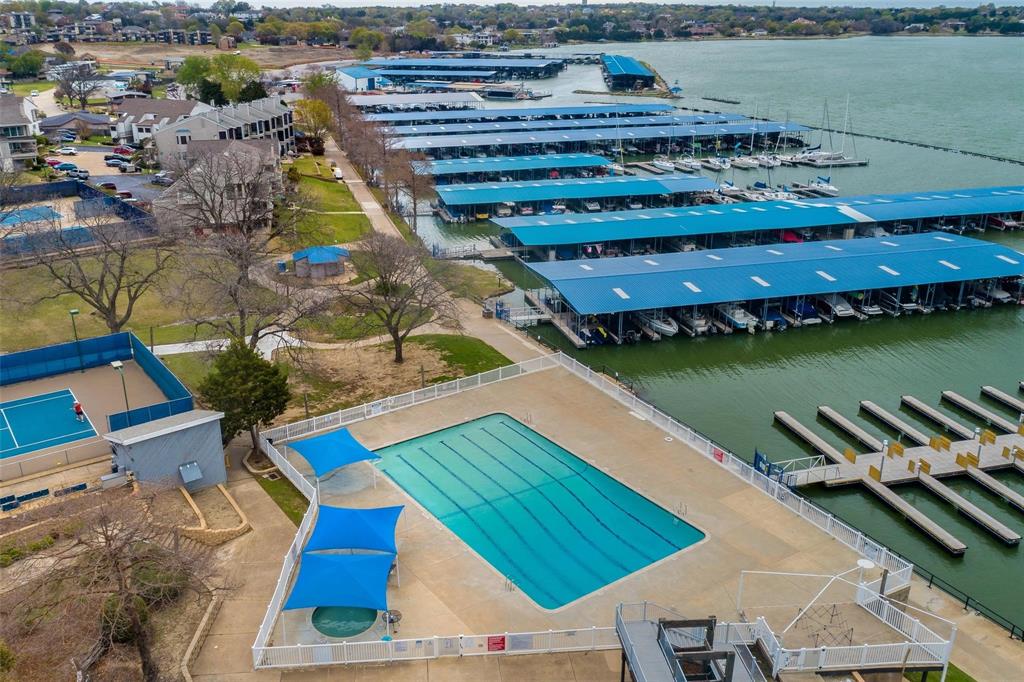 5422 Ranger Drive Rockwall, TX 75032 - Photo 31 of 32 a view of a swimming pool with outdoor seating
