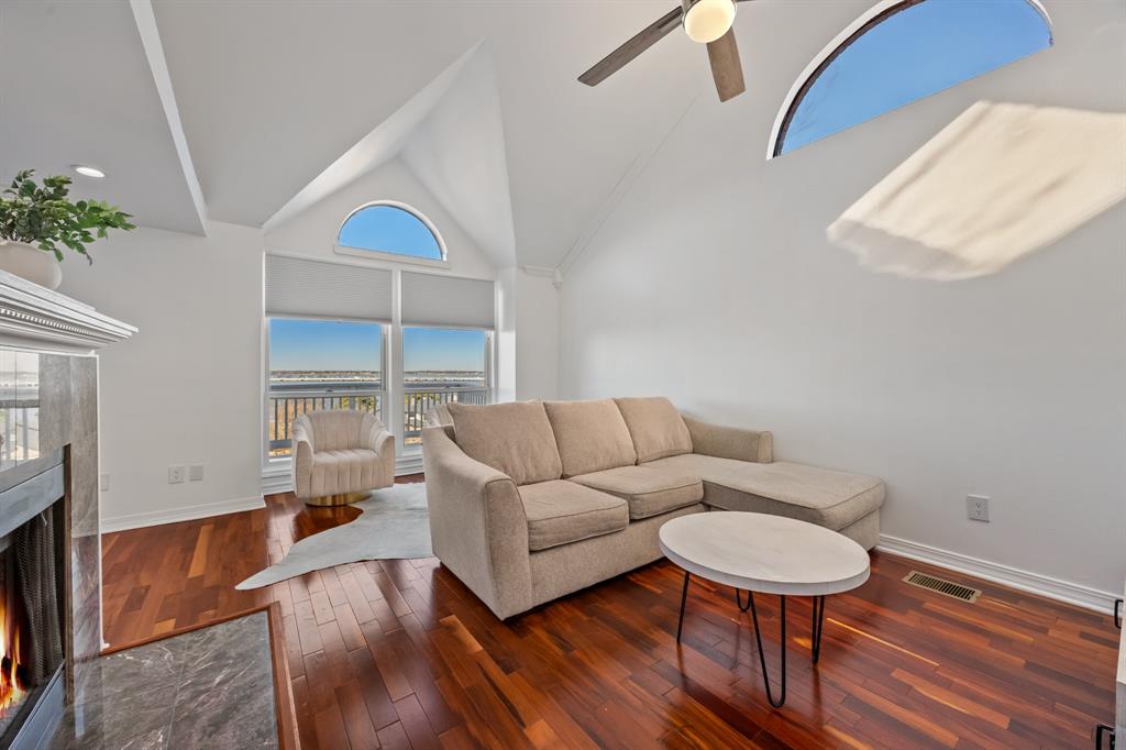 5422 Ranger Drive Rockwall, TX 75032 - Photo 9 of 32 a living room with furniture and a wooden floor