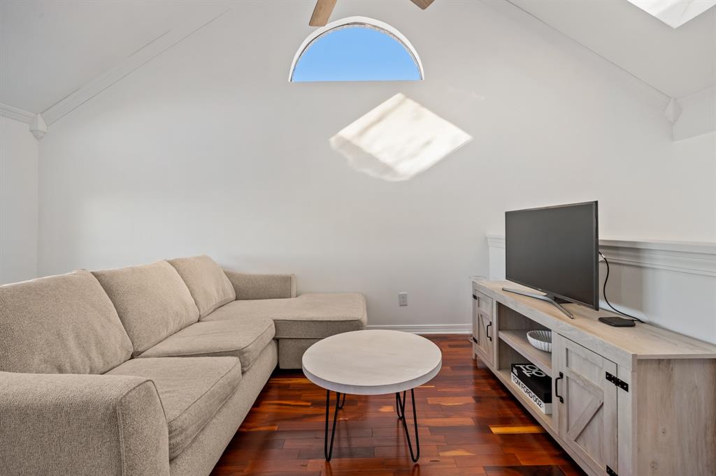 5422 Ranger Drive Rockwall, TX 75032 - Photo 10 of 32 a living room with furniture and a flat screen tv